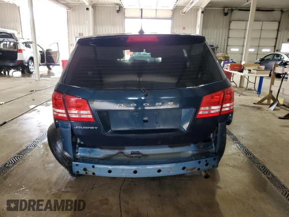2013 Dodge Journey American Value with VIN 3C4PDCAB4DT581984, listed as a Copart auction lot 59953515 with 166,927 mi miles and Salvage title. Bid and sale history available at DreamBid. Image 6.