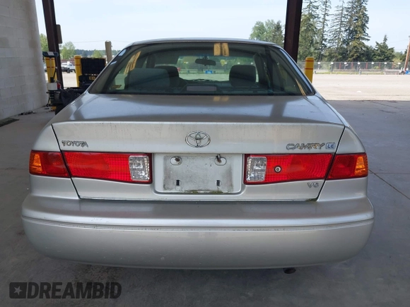 2000 Toyota Camry LE z VIN JT2BF22K2Y0239961, wystawiony jako IAAI lot #42128226 z przebiegiem 154 691 mil mil oraz . Historia ofert i sprzedaży dostępna na DreamBid. Obrazek 16.