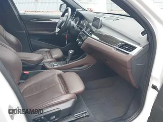 2018 BMW X1 xDrive28i with VIN WBXHT3C36J5L32162, listed as a IAAI auction lot 41802315 with 80,422 mi miles. Bid and sale history available at carsss.com. Image 5.