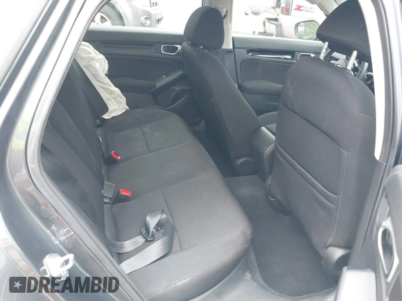 2023 Honda Civic EX with VIN 2HGFE1F73PH312228, listed as a IAAI auction lot 42185408 with 19,339 mi miles and . Bid and sale history available at DreamBid. Image 8.