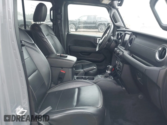 2023 Jeep Wrangler Sahara with VIN 1C4JJXP6XPW698886, listed as a IAAI auction lot 42439690 with 41,787 mi miles and . Bid and sale history available at DreamBid. Image 5.
