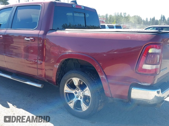 2019 Ram 1500 Laramie with VIN 1C6SRFJT2KN677400, listed as a IAAI auction lot 42441010 with 76,750 mi miles and . Bid and sale history available at DreamBid. Image 19.