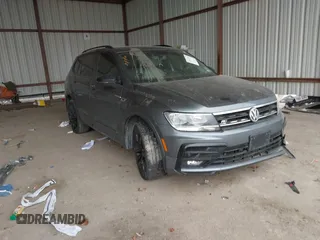 2021 Volkswagen Tiguan SE with VIN 3VV3B7AX5MM034127, listed as a IAAI auction lot 41617206 with 61,170 mi miles and . Bid and sale history available at DreamBid. Image 1.