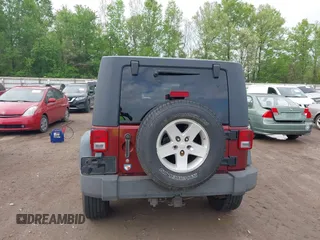 2008 Jeep Wrangler Unlimited X with VIN 1J4GA39108L606685, listed as a IAAI auction lot 41965538 with 288,946 mi miles. Bid and sale history available at carsss.com. Image 16.