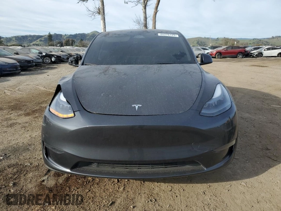2024 Tesla Model Y with VIN 7SAYGDED5RF105278, listed as a Copart auction lot 44376125 with 12,693 mi miles and Salvage Title. Bid and sale history available at DreamBid. Image 5.