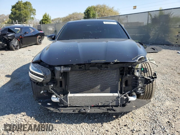 2022 Genesis G70 2.0T with VIN KMTG34TAXNU093905, listed as a Copart auction lot 45394115 with 57,495 mi miles and Salvage Title. Bid and sale history available at carsss.com. Image 5.
