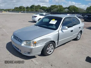 2002 Hyundai Accent GL with VIN KMHCG45C82U268756, listed as a IAAI auction lot 41569829 with 89,752 mi miles. Bid and sale history available at carsss.com. Image 17.