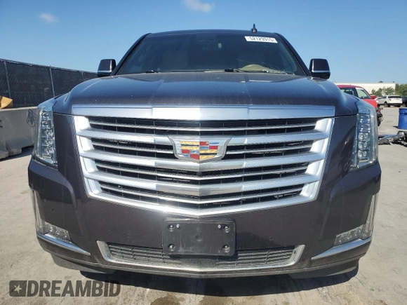 2018 Cadillac Escalade Platinum z VIN 1GYS4DKJ4JR187437, wystawiony jako Copart lot #52129915 z przebiegiem 70 128 mil mil oraz Czysty tytuł • Clean title. Historia ofert i sprzedaży dostępna na DreamBid. Obrazek 5.