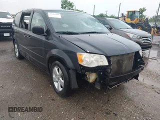 2013 Dodge Grand Caravan SE with VIN 2C4RDGBG8DR736291, listed as a IAAI auction lot 42161396 with Not Provided miles and . Bid and sale history available at DreamBid. Image 6.