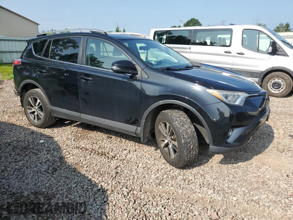 2018 Toyota RAV4 XLE with VIN 2T3RFREV0JW765995, listed as a Copart auction lot 63968785 with 114,598 mi miles and Salvage title. Bid and sale history available at DreamBid. Image 4.