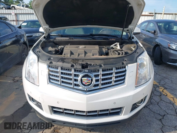 2013 Cadillac SRX Premium Collection with VIN 3GYFNJE33DS625036, listed as a IAAI auction lot 42464711 with 83,344 mi miles and . Bid and sale history available at DreamBid. Image 10.