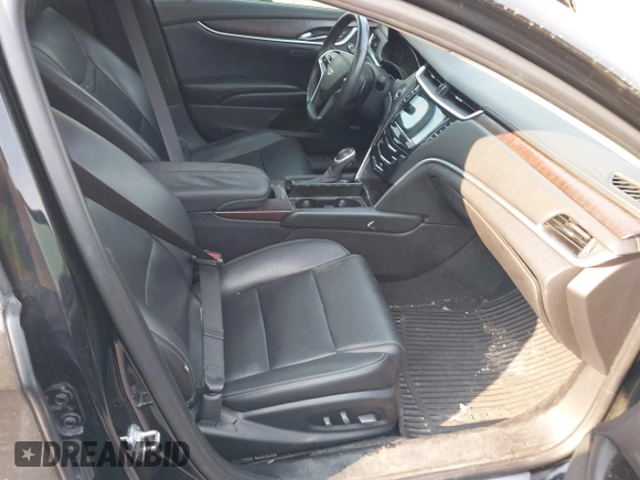2019 Cadillac XTS Luxury with VIN 2G61M5S38K9100792, listed as a IAAI auction lot 41676187 with 103,056 mi miles and . Bid and sale history available at DreamBid. Image 5.