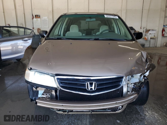 2004 Honda Odyssey LX z VIN 5FNRL18554B007005, wystawiony jako Copart lot #54377345 z przebiegiem 219 655 mil mil oraz Szkoda całkowita • Salvage title. Historia ofert i sprzedaży dostępna na DreamBid. Obrazek 5.