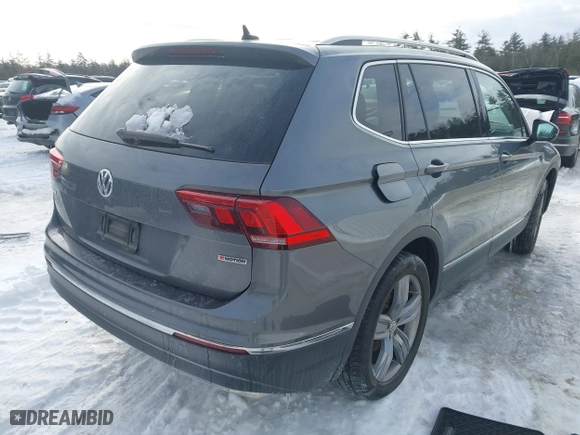 2020 Volkswagen Tiguan SE with VIN 3VV2B7AXXLM093989, listed as a IAAI auction lot 41599430 with 28,801 mi miles. Bid and sale history available at carsss.com. Image 4.