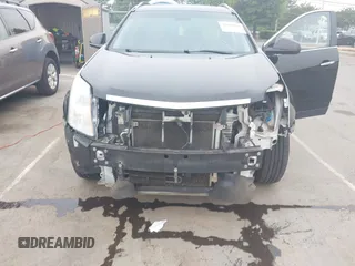 2011 Cadillac SRX Luxury Collection with VIN 3GYFNAEY2BS555800, listed as a IAAI auction lot 42118889 with 172,614 mi miles and . Bid and sale history available at carsss.com. Image 6.