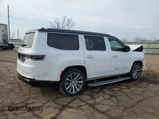 2023 Jeep Grand Wagoneer z VIN 1C4SJVEJ4PS550269, wystawiony jako Copart lot #52693175 z przebiegiem 9 915 mil mil oraz Szkoda całkowita • Salvage title. Historia ofert i sprzedaży dostępna na DreamBid. Obrazek 3.