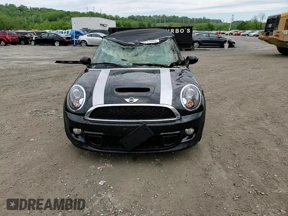 2013 MINI Convertible S with VIN WMWZP3C51DT297891, listed as a Copart auction lot 56745065 with 101,292 mi miles and Salvage title. Bid and sale history available at DreamBid. Image 14.