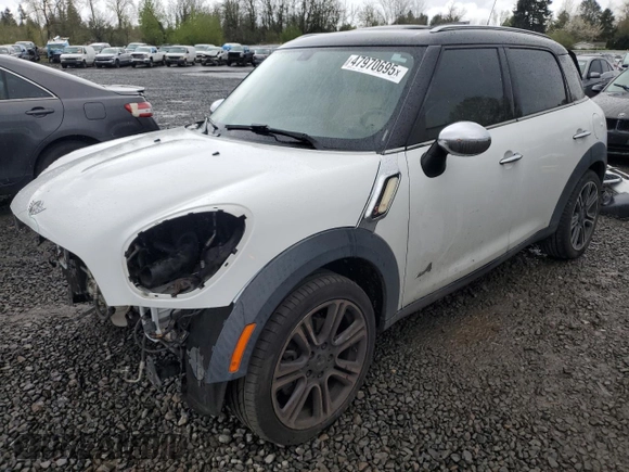 2012 MINI Countryman S with VIN WMWZC5C5XCWL55579, listed as a Copart auction lot 47970695 with 136,015 mi miles and Salvage Title. Bid and sale history available at DreamBid. Image 1.