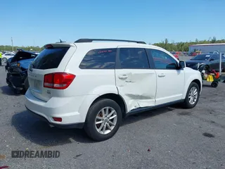 2015 Dodge Journey SXT with VIN 3C4PDCBG4FT727376, listed as a IAAI auction lot 42029881 with 151,042 mi miles. Bid and sale history available at carsss.com. Image 6.