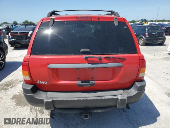 1999 Jeep Grand Cherokee Laredo z VIN 1J4G258SXXC518308, wystawiony jako Copart lot #56636235 z przebiegiem 233 649 mil mil oraz Szkoda całkowita • Salvage title. Historia ofert i sprzedaży dostępna na DreamBid. Obrazek 6.