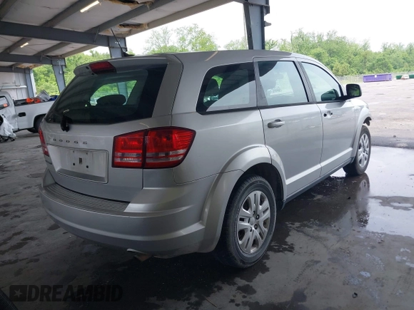 2014 Dodge Journey SE with VIN 3C4PDCAB1ET194066, listed as a IAAI auction lot 42117527 with 184,490 mi miles and . Bid and sale history available at carsss.com. Image 4.