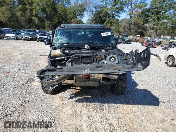 2006 Hummer H2 z VIN 5GRGN23U06H104393, wystawiony jako Copart lot #46208975 z przebiegiem 168 053 mil mil oraz Szkoda całkowita • Salvage title. Historia ofert i sprzedaży dostępna na DreamBid. Obrazek 5.
