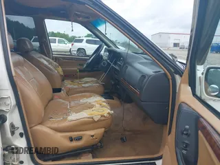 1996 Jeep Grand Cherokee Limited z VIN 1J4GZ78YXTC191527, wystawiony jako IAAI lot #42352616 z przebiegiem 325 927 mil mil oraz . Historia ofert i sprzedaży dostępna na DreamBid. Obrazek 5.
