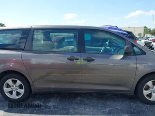 2012 Toyota Sienna with VIN 5TDZK3DC8CS190719, listed as a IAAI auction lot 41983695 with 68,377 mi miles and . Bid and sale history available at DreamBid. Image 14.