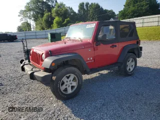 2009 Jeep Wrangler X with VIN 1J4FA24109L700709, listed as a Copart auction lot 62570375 with 82,445 mi miles and Salvage title. Bid and sale history available at DreamBid. Image 1.
