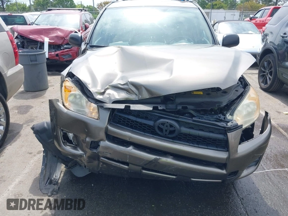 2009 Toyota RAV4 with VIN JTMZF33V69D015171, listed as a IAAI auction lot 42006163 with 122,927 mi miles. Bid and sale history available at carsss.com. Image 6.
