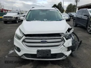 2018 Ford Escape SE z VIN 1FMCU9GD5JUB12877, wystawiony jako Copart lot #51973295 z przebiegiem 121 698 mil mil oraz Szkoda całkowita • Salvage title. Historia ofert i sprzedaży dostępna na DreamBid. Obrazek 5.