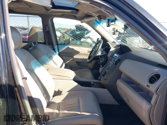 2012 Honda Pilot EX-L with VIN 5FNYF3H63CB036962, listed as a IAAI auction lot 41316371 with 225,394 mi miles and . Bid and sale history available at DreamBid. Image 5.