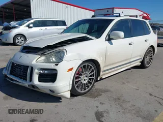 2009 Porsche Cayenne GTS with VIN WP1AD29P19LA63400, listed as a IAAI auction lot 41629130 with 165,932 mi miles and . Bid and sale history available at DreamBid. Image 2.