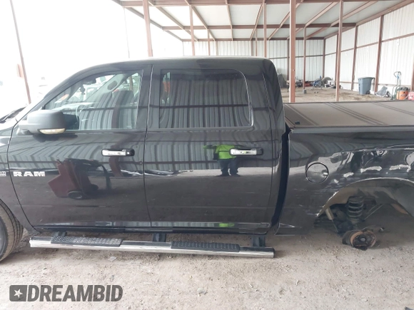 2009 Dodge 1500 SLT with VIN 1D3HB13T49S712884, listed as a IAAI auction lot 41428616 with 213,978 mi miles and . Bid and sale history available at DreamBid. Image 14.