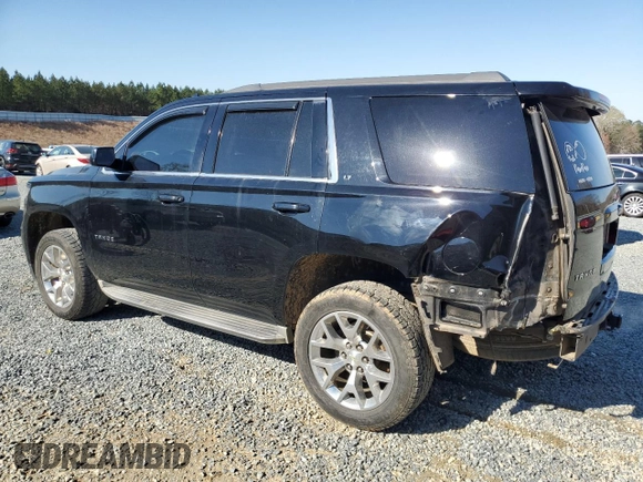 2015 Chevrolet Tahoe LT with VIN 1GNSCBKC0FR521749, listed as a Copart auction lot 50480075 with 156,940 mi miles and Salvage Title. Bid and sale history available at DreamBid. Image 2.