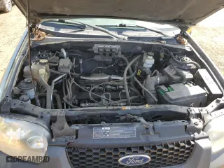 2005 Ford Escape XLS Value with VIN 1FMYU92Z45KE32184, listed as a Copart auction lot 52211135 with 149,533 mi miles and Clean Title. Bid and sale history available at carsss.com. Image 12.