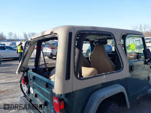 2001 Jeep Wrangler Sport with VIN 1J4FA49S31P317597, listed as a IAAI auction lot 41839524 with 145,164 mi miles. Bid and sale history available at carsss.com. Image 12.