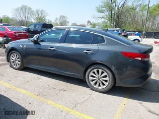 2016 Kia Optima EX with VIN 5XXGU4L38GG022501, listed as a IAAI auction lot 42071944 with 122,502 mi miles. Bid and sale history available at carsss.com. Image 14.