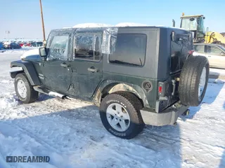 2010 Jeep Wrangler Unlimited Sport with VIN 1J4BA3H12AL127802, listed as a IAAI auction lot 41237029 with 94,320 mi miles. Bid and sale history available at carsss.com. Image 3.