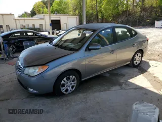 2010 Hyundai Elantra GLS with VIN KMHDU4AD7AU044338, listed as a Copart auction lot 52128285 with 149,336 mi miles and Salvage title. Bid and sale history available at DreamBid. Image 1.
