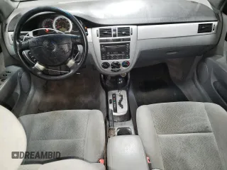 2004 Suzuki Forenza S z VIN KL5JD52Z14K975804, wystawiony jako Copart lot #43227455 z przebiegiem 114 726 mil mil oraz Szkody całkowita. Historia ofert i sprzedaży dostępna na DreamBid. Obrazek 8.