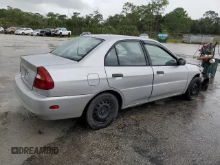 2001 Mitsubishi Mirage ES z VIN JA3AY26C91U026230, wystawiony jako Copart lot #74546944 z przebiegiem 172 111 mil mil oraz Szkoda całkowita • Salvage title. Historia ofert i sprzedaży dostępna na DreamBid. Obrazek 3.