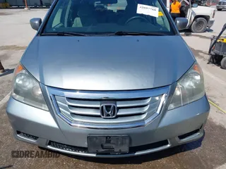2010 Honda Odyssey EX with VIN 5FNRL3H44AB059711, listed as a IAAI auction lot 42057760 with 225,486 mi miles and . Bid and sale history available at DreamBid. Image 12.