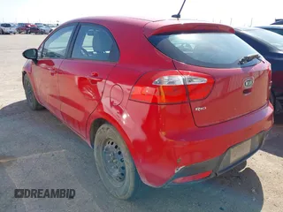 2012 Kia Rio LX with VIN KNADM5A35C6058809, listed as a IAAI auction lot 42052025 with 124,266 mi miles. Bid and sale history available at carsss.com. Image 3.