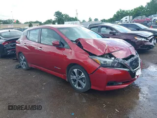 2018 Nissan LEAF SL z VIN 1N4AZ1CP6JC309471, wystawiony jako IAAI lot #42518388 z przebiegiem 63 765 mil mil oraz . Historia ofert i sprzedaży dostępna na DreamBid. Obrazek 1.