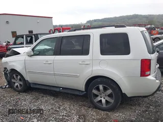 2012 Honda Pilot Touring z VIN 5FNYF4H93CB030515, wystawiony jako IAAI lot #41936563 z przebiegiem Nie podano mil oraz . Historia ofert i sprzedaży dostępna na DreamBid. Obrazek 13.