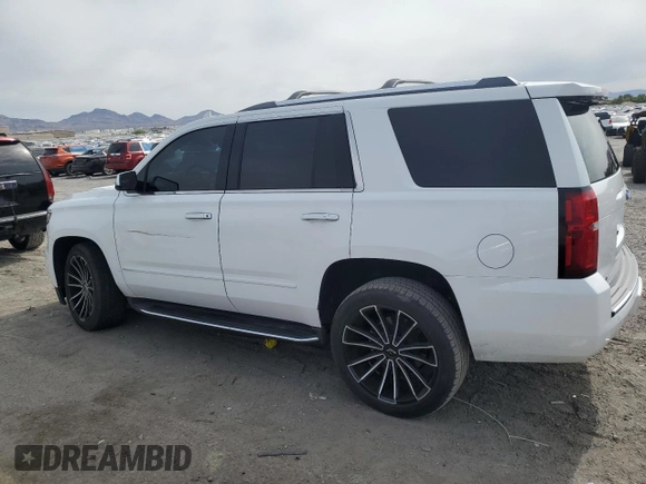 2018 Chevrolet Tahoe Premier with VIN 1GNSKCKC6JR195246, listed as a Copart auction lot 54887165 with 135,973 mi miles and Salvage title. Bid and sale history available at DreamBid. Image 2.