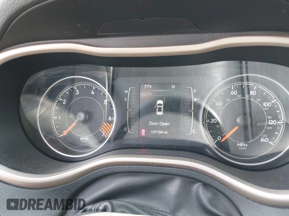2015 Jeep Cherokee Latitude with VIN 1C4PJLCB9FW627909, listed as a IAAI auction lot 42034667 with 131,739 mi miles and . Bid and sale history available at carsss.com. Image 7.