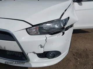 2015 Mitsubishi Lancer SE with VIN JA32V2FW9FU025402, listed as a IAAI auction lot 41646407 with 67,201 mi miles. Bid and sale history available at carsss.com. Image 17.