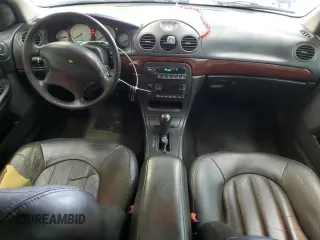 2002 Chrysler 300M M z VIN 2C3HE66GX2H177234, wystawiony jako Copart lot #77024884 z przebiegiem 73 986 mil mil oraz Szkoda całkowita • Salvage title. Historia ofert i sprzedaży dostępna na DreamBid. Obrazek 8.